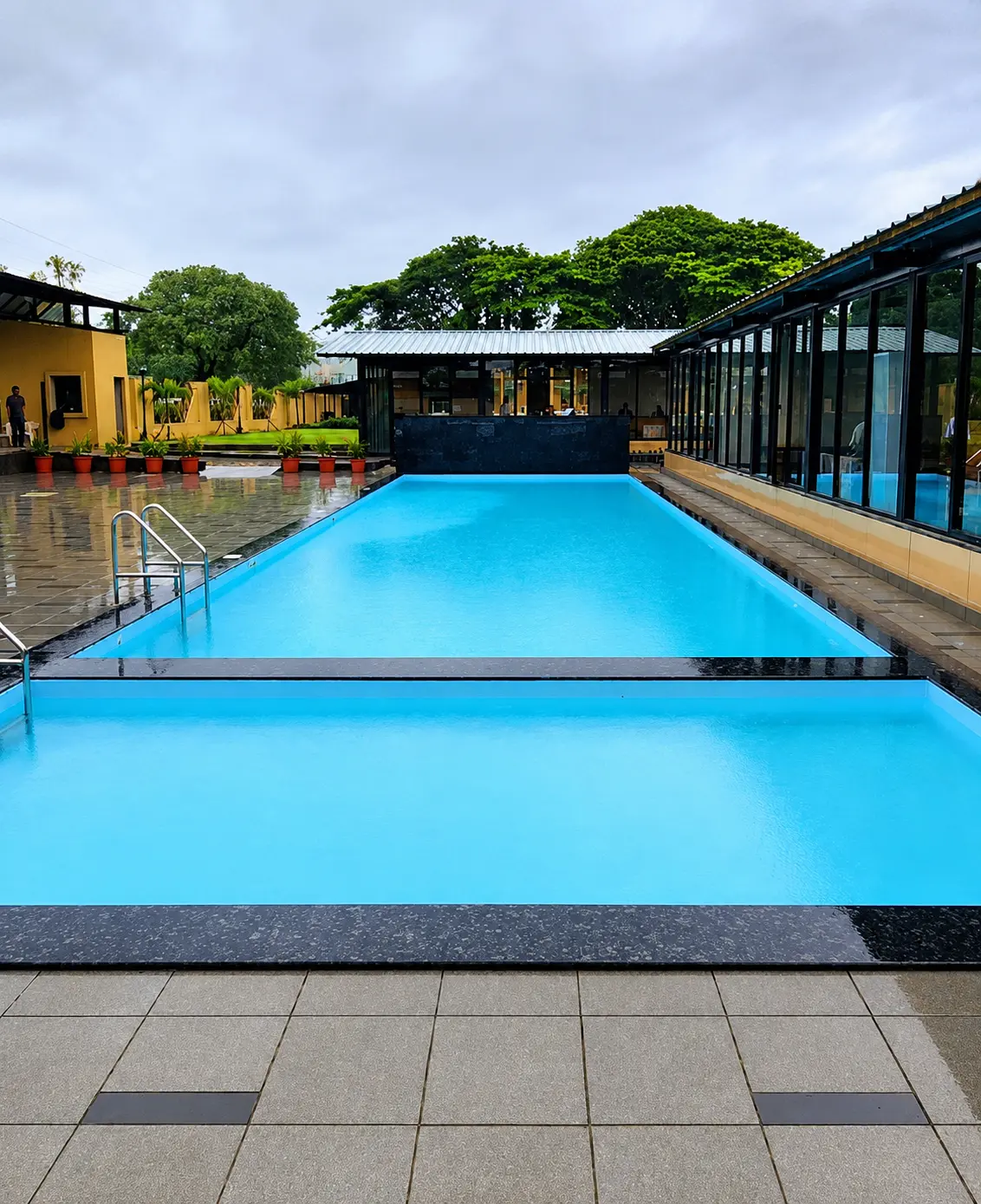 Luxury swimming pool construction project in Dehradun, Uttarakhand by YNextGen Sports Infra