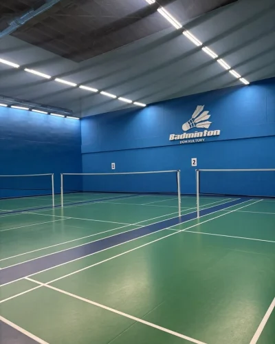 Indoor badminton court construction with PU flooring for schools and defence establishments in India