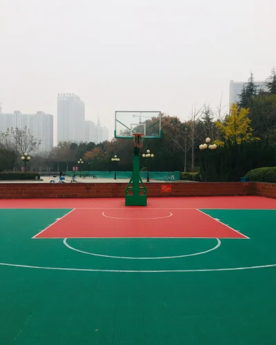 High-performance acrylic basketball court constructed for schools and residential projects in India