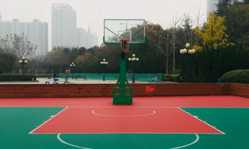 High-performance acrylic basketball court constructed for schools and residential projects in India
