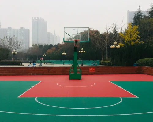 High-performance acrylic basketball court constructed for schools and residential projects in India