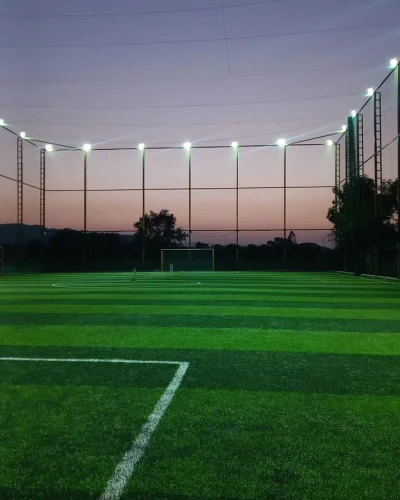 Professional football synthetic turf ground with artificial grass and LED floodlights in India
