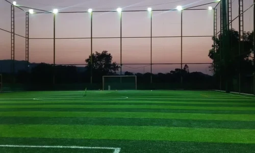 Professional football synthetic turf ground with artificial grass and LED floodlights in India