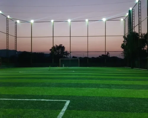 Professional football synthetic turf ground with artificial grass and LED floodlights in India