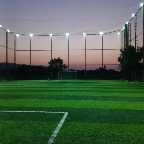 Professional football synthetic turf ground with artificial grass and LED floodlights in India