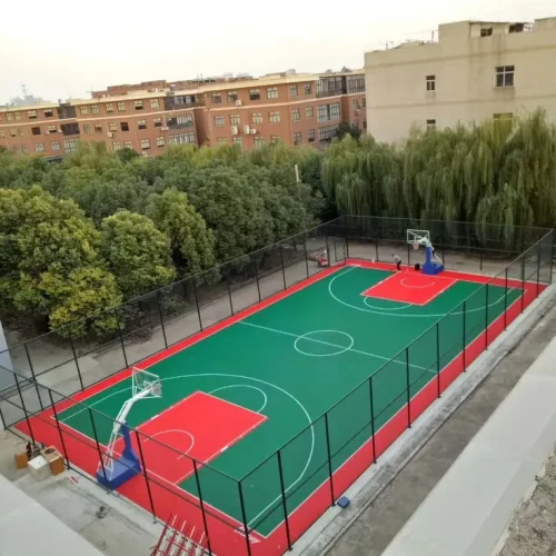 Basketball court flooring in Dehradun Uttarakhand by YNextGen Sports Infra with acrylic surface