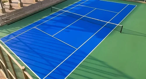 Professional outdoor tennis court flooring with acrylic surface by YNextGen Sports Infra India